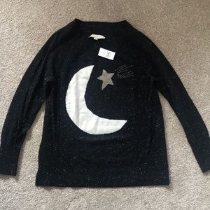Black sweater with moon and star